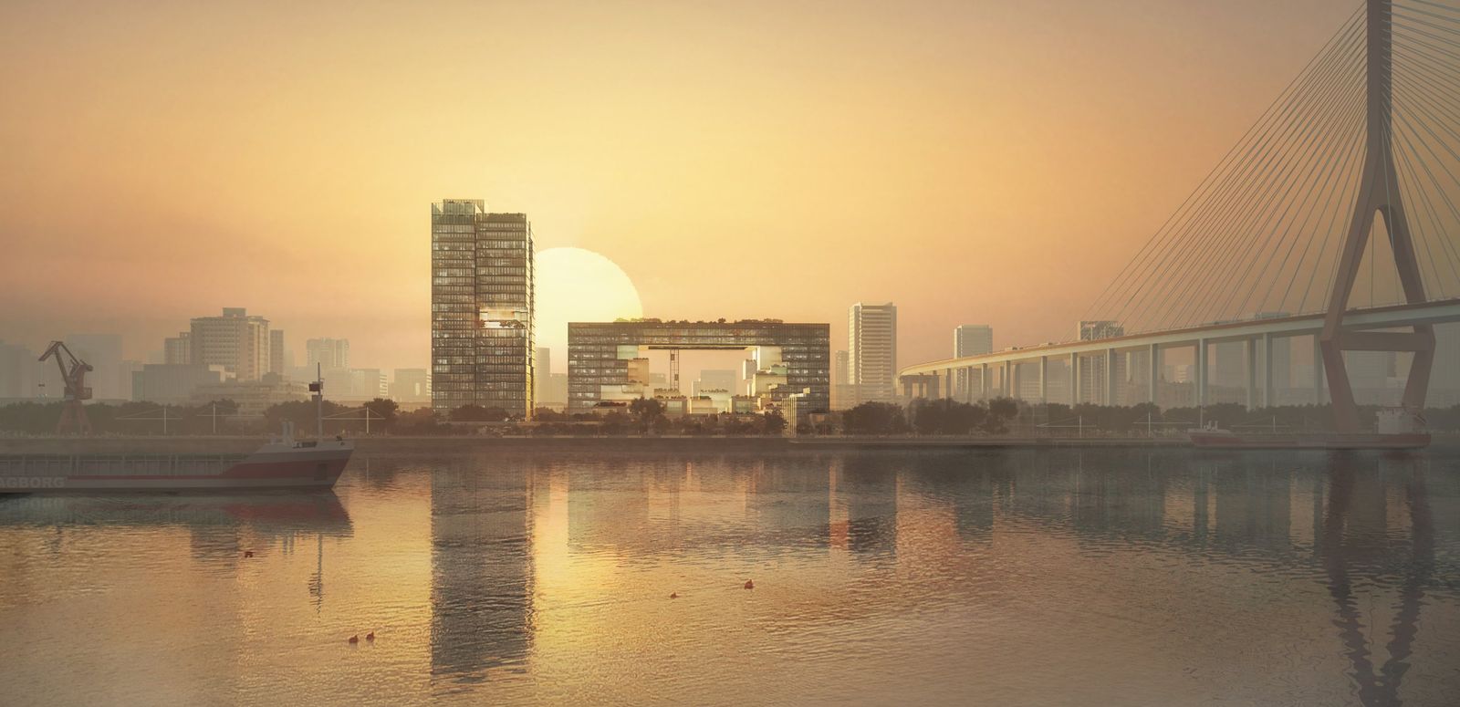 Riverfront at sunset: a slender glass tower beside a long elevated block bridging two low wings, its roof and openings planted with gardens, reflected in the water beside a cable-stayed bridge