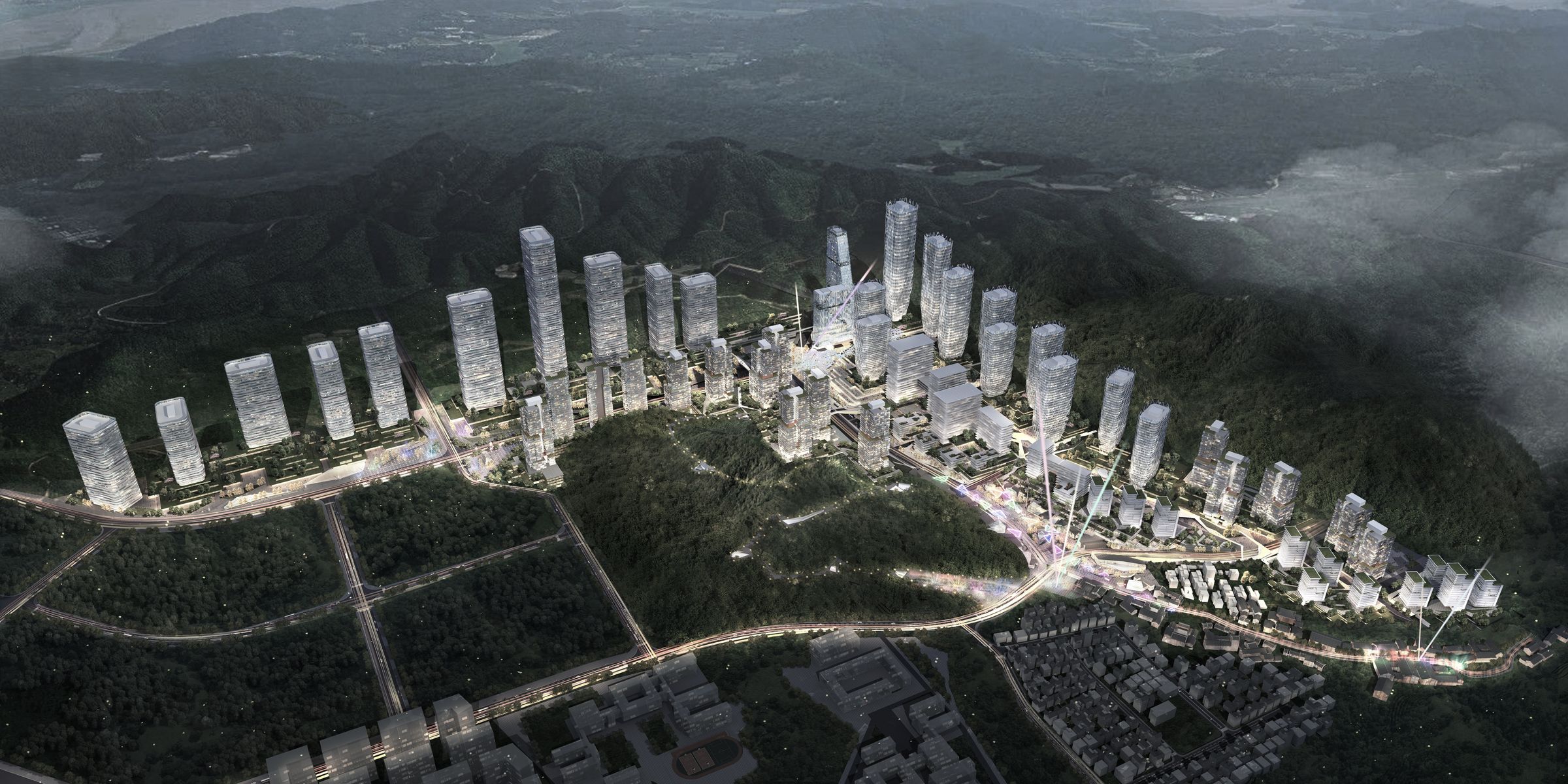 Aerial view at dusk of the Gankeng valley masterplan: towers set along the foot of the mountains, a lit promenade on the valley floor and the Hakka village in the foreground