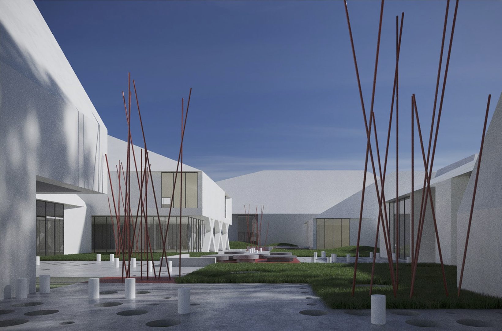 Red poles rising in a courtyard between white buildings with angled walls