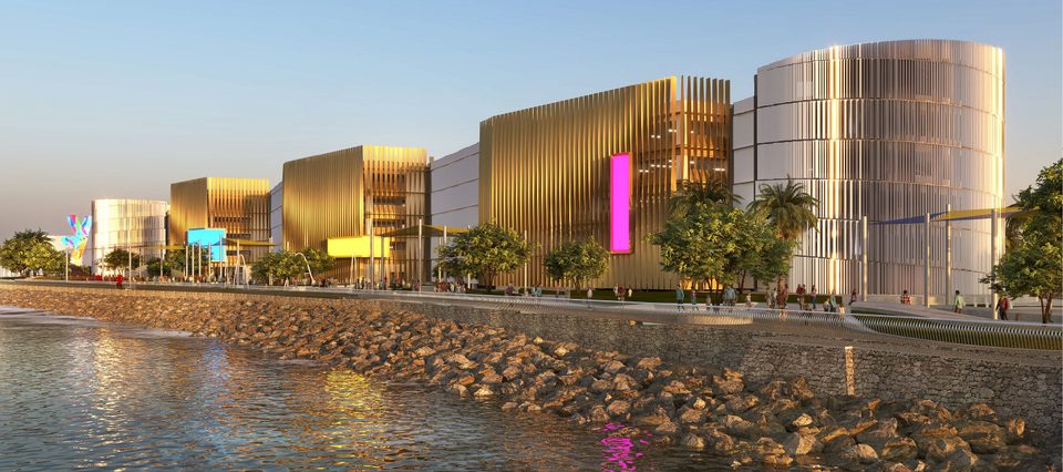 Option 1, Obhur Waves: the car park seen from the sea, wrapped in vertical brushed-metal fins in gold and silver tones