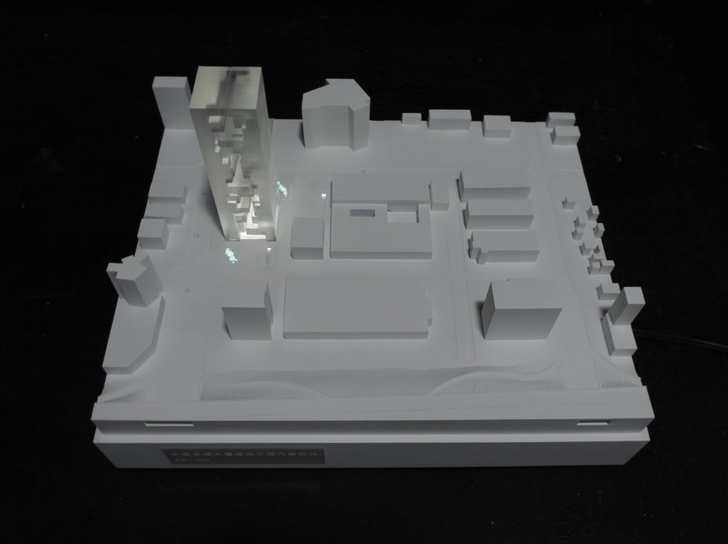 White context model: the tower massing on its plot among the neighbouring blocks